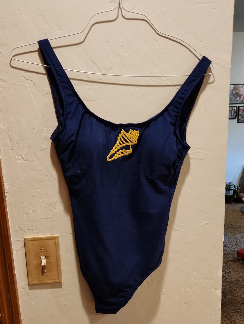 Navy One-Piece Swimsuit with Yellow Shell Accent